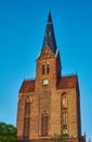 Medieval Gothic church with a bell tower in Friedland