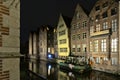 Medieval guildhouses along Lieve canal at night in Ghent