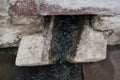 Ancient communication stones. Medieval gutter. Royalty Free Stock Photo