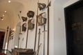 Medieval helmets, cuirass, swords, pistols and halberds.