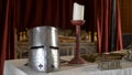 Medieval interior with details and objects. Action. Silver knight`s helmet and candle stand on table in medieval