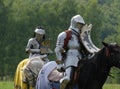 Medieval knight in armor on horseback Royalty Free Stock Photo