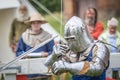 A medieval knight swordfighting
