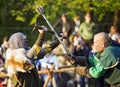 The staging of medieval sword fighting Royalty Free Stock Photo