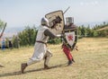 Medieval knight battle with swords and shields