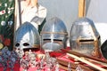 Medieval knight helmets on the table Royalty Free Stock Photo