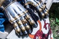 Medieval Knight Metal Hand Gloves on Shield: Traditional Weapons at Middle Age Theme Festival Royalty Free Stock Photo