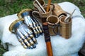 Medieval Knight Metal Hand Gloves and Wooden Cup: Authentic Middle Ages Equipment Royalty Free Stock Photo