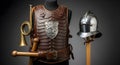 Medieval Knight\'s Armor Set: Leather Cuirass, Bugle Horn, and Helmet on Display Royalty Free Stock Photo