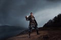 Medieval knight with sword in armor as style Game of Thrones in