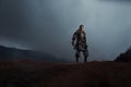 Medieval knight with sword in armor as style Game of Thrones in Royalty Free Stock Photo