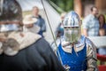 A medieval knight swordfighting