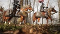 Medieval knights ride their faithful war horses to fight on the battlefield. Historical medieval concept. 3D Rendering. Royalty Free Stock Photo