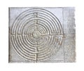 Medieval labyrinth carved on the facade of a Romanesque church o