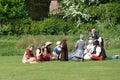 Medieval ladies in re-enactment enjoying picnic Royalty Free Stock Photo