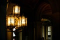 Medieval lantern in the night gothic city. Old lanterns illuminating a dark alleyway medieval street at nigh. Low key photo with Royalty Free Stock Photo