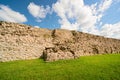 The medieval limestone wall on a summer sunny day