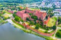 Medieval Malbork Marienburg Castle in Poland, main fortress of the Teutonic Knights at the Nogat river. Aerial skyline view of