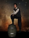 Medieval man with foot on barrel Royalty Free Stock Photo