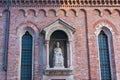 Aedicula of St Peter on the facade of San Pietro in Archivolto Church, Verona, Italy