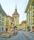 Medieval Marktgasse street with outstanding nna-Seiler-Brunnen fountain with colorful sculpture in Bern, Switzerland