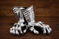 Medieval metal glove, detail of part of ancient armor Royalty Free Stock Photo