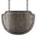 Medieval metal signboard hanging on chains