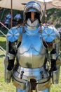 Medieval Metallic Armor with Helmet near White Tent