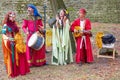 Medieval minstrels playing music