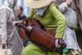 Medieval musical instrument Hurdy-gurdy held by a lady musician..