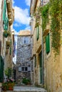Medieval narrow street in old town of Hvar in Croatia Royalty Free Stock Photo