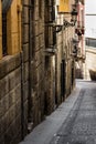 Medieval narrow streets of Alicante old town historic district Santa Cruz