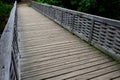 Medieval oak wood, bolted. Bridge over the moat. the railing is made of massive beams, between which several thin oak rods are wov