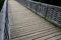 Medieval oak wood, bolted. Bridge over the moat. the railing is made of massive beams, between which several thin oak rods are wov