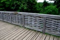 Medieval oak wood, bolted. Bridge over the moat. the railing is made of massive beams, between which several thin oak rods are wov