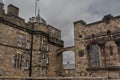 Medieval old buildings in the historic Edinburgh Castle under stormy overcast sky Royalty Free Stock Photo