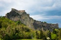 Medieval old fortress of in San Leo town on rock in the Marche regions in Italy Royalty Free Stock Photo