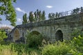 Medieval one hundred meter long stone Kadin bridge build over the river Struma Royalty Free Stock Photo