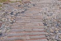 a medieval path tiled with stones