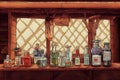 Medieval pharmacy store. Alchemical workplace with many bottles. Generative ai illustration