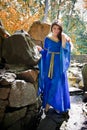 Medieval princess in stone garden Royalty Free Stock Photo