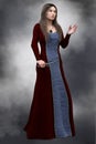 Medieval Queen in historical dress carrying a ceremonial dagger, 3D CG Royalty Free Stock Photo