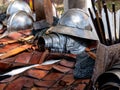 table with medieval soldier equipment on display Royalty Free Stock Photo