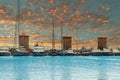 Medieval Rhodes Town Windmills and yachts, Mandraki harbor, Greece