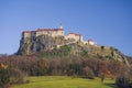 The medieval Riegersburg Castle on top of a dormant volcano, surrounded by beautiful autumn landscape, famous tourist attraction