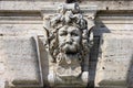 Medieval roman stone sculpture on the wall