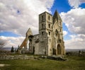 Medieval, romanesque church under a cloudy sky. Royalty Free Stock Photo