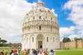 Pisa, Italy - May 24, 2018: Medieval Romanesque Pisa Baptistery of St. John Battistero di San Giovanni at Piazza dei Miracoli