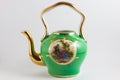 Medieval romantic green and gold teapot