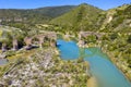 Medieval Roncal bridge of Yesa, which crosses the Aragon river Spain Royalty Free Stock Photo